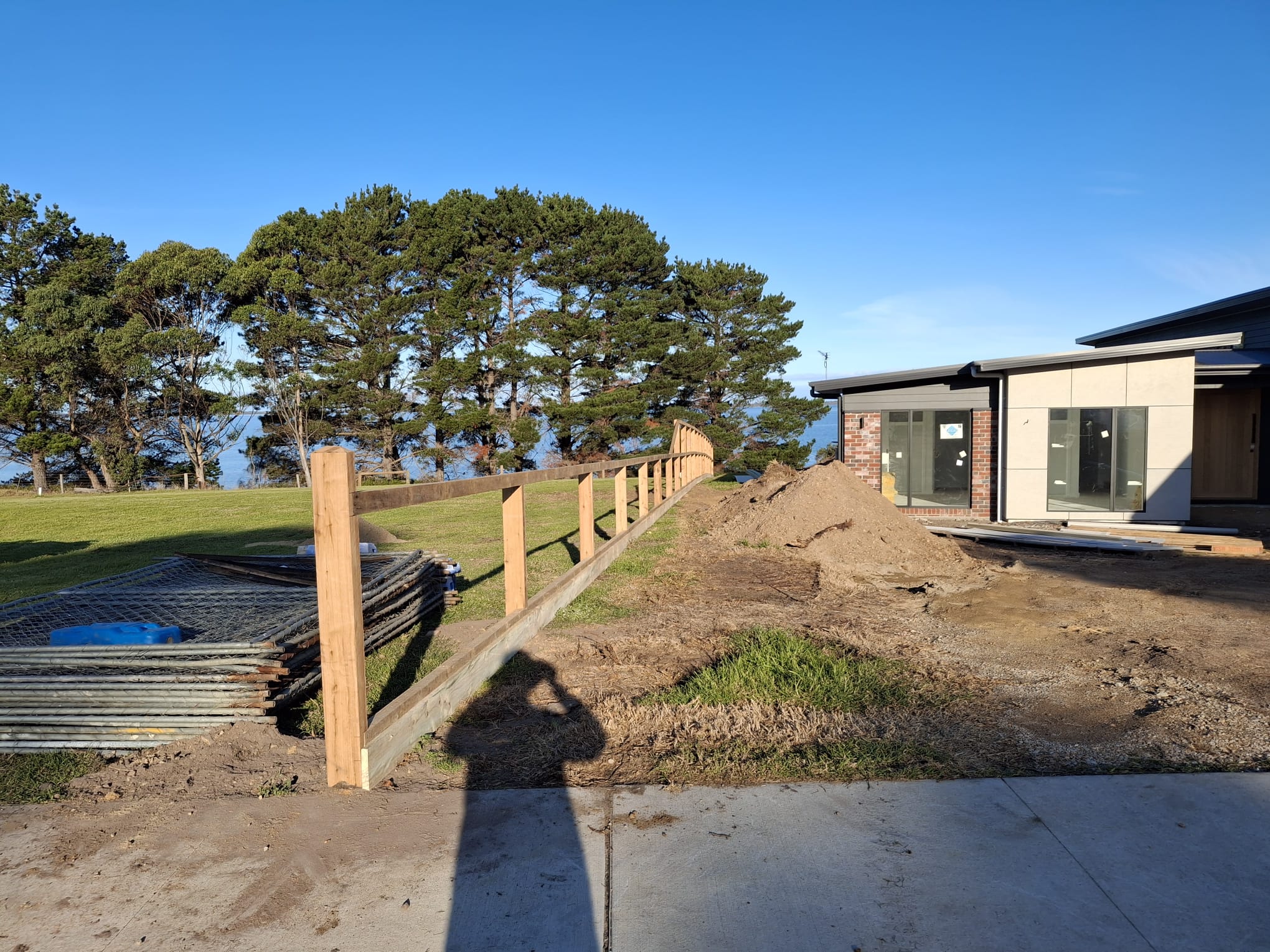Timber fence construction in progress